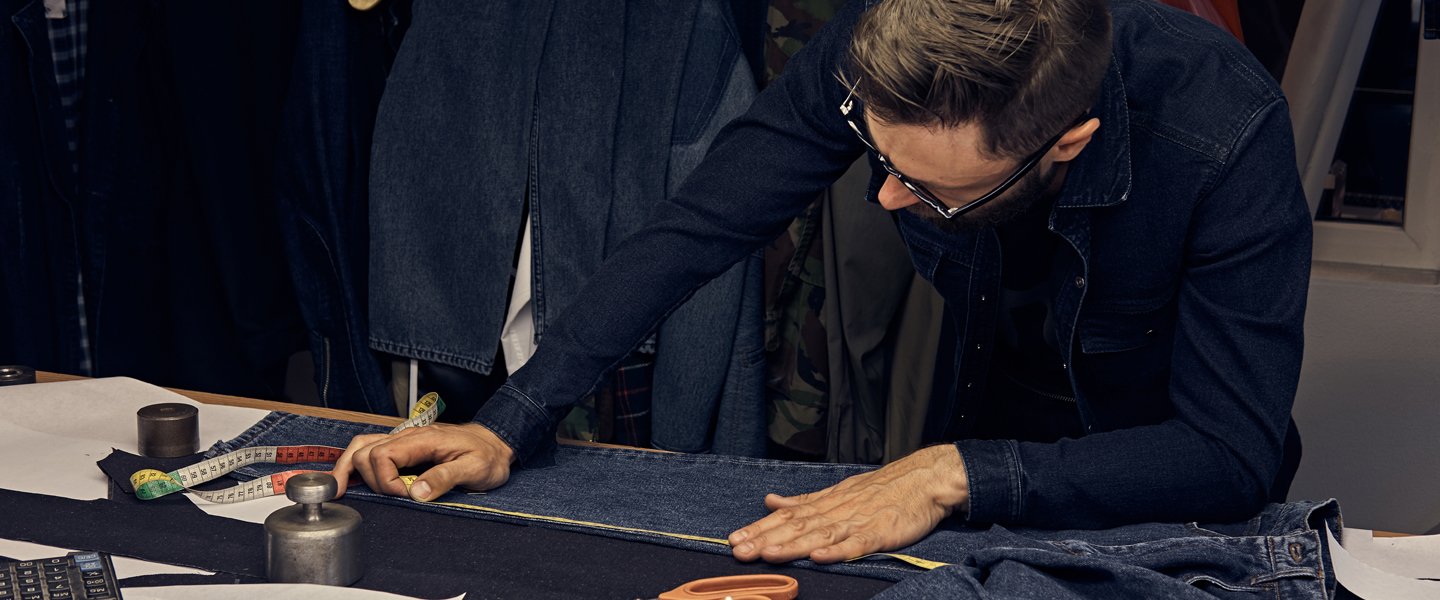 Measuring denim fabric during apparel sample development