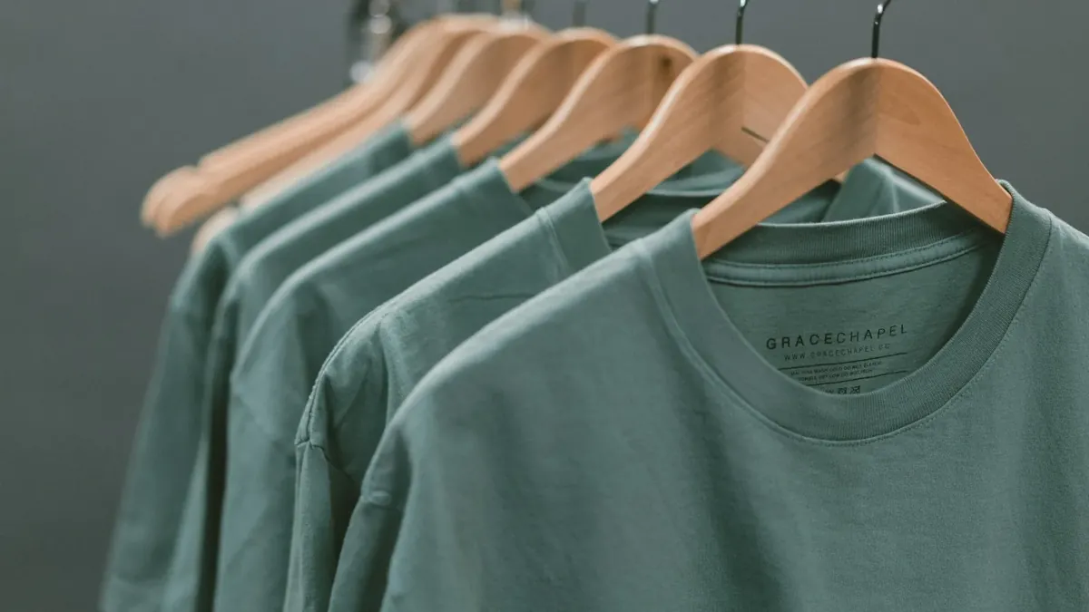 Photo of blue crew-neck tops