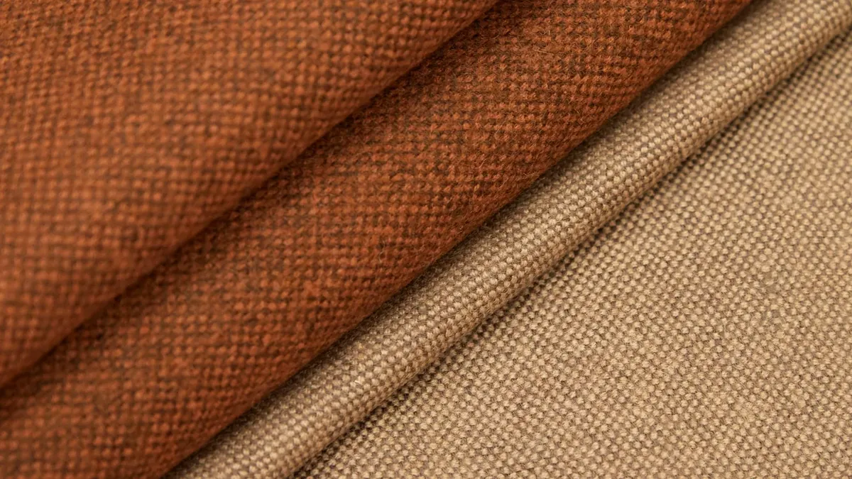 A close up of a brown and tan fabric